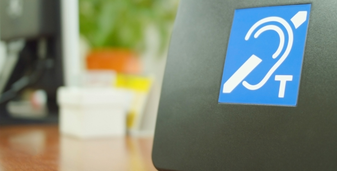 Hearing loop, T-position system on a desk for the Deaf.