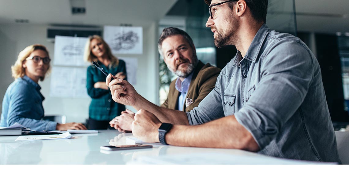 Team of professionals discussing over new business project